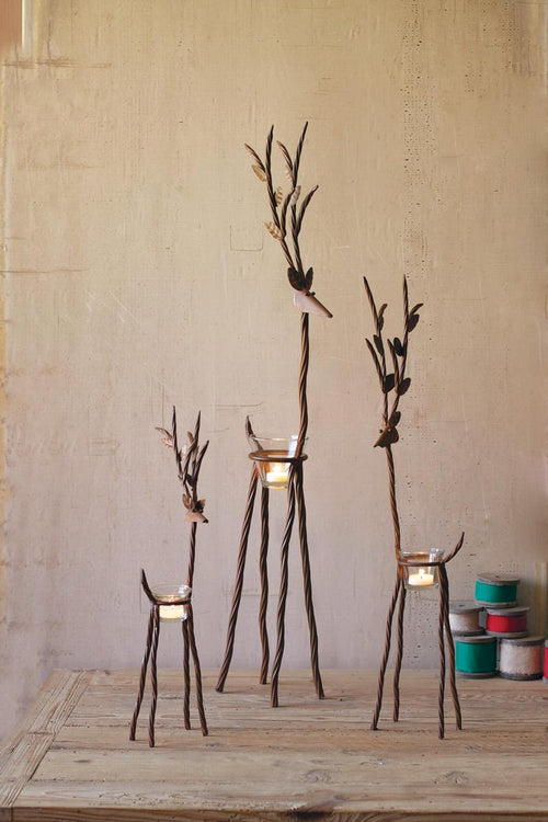 SET OF THREE RUSTIC IRON REINDEER WITH TEALIGHT CUPS