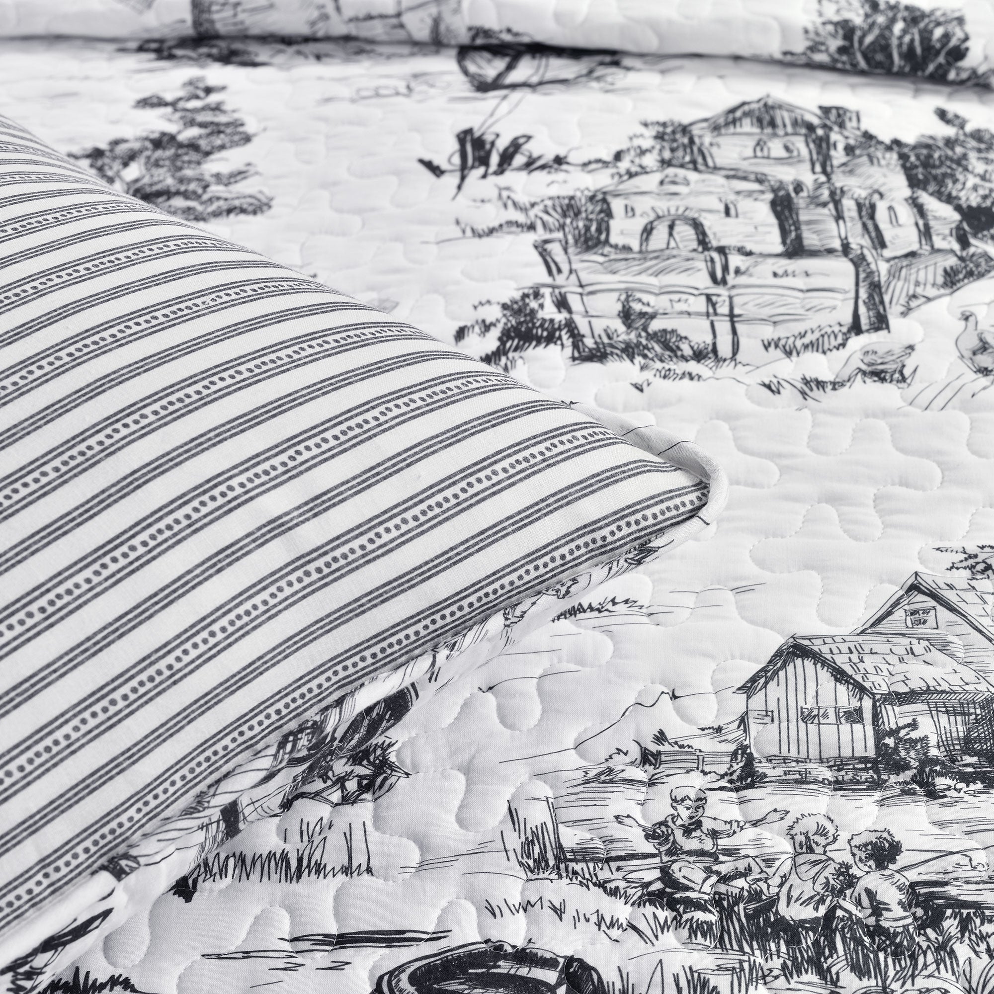 https://rustictuesday.com/cdn/shop/products/16T005442-FRENCH-COUNTRY-TOILE-COTTON-REVERSIBLE-3-PC-WHITE-CHARCOAL-QUILT-FULL-QUEEN-848742097335-ALT-4_2400x.jpg?v=1616188248