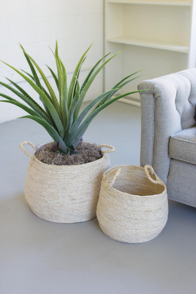 SET OF TWO ROUND SEAGRASS BASKETS WITH HANDLES