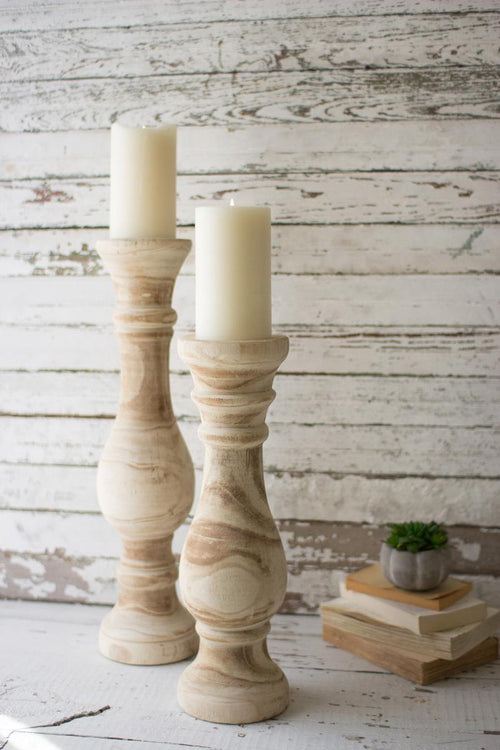 SET OF TWO HAND CARVED WOODEN CANDLE STANDS