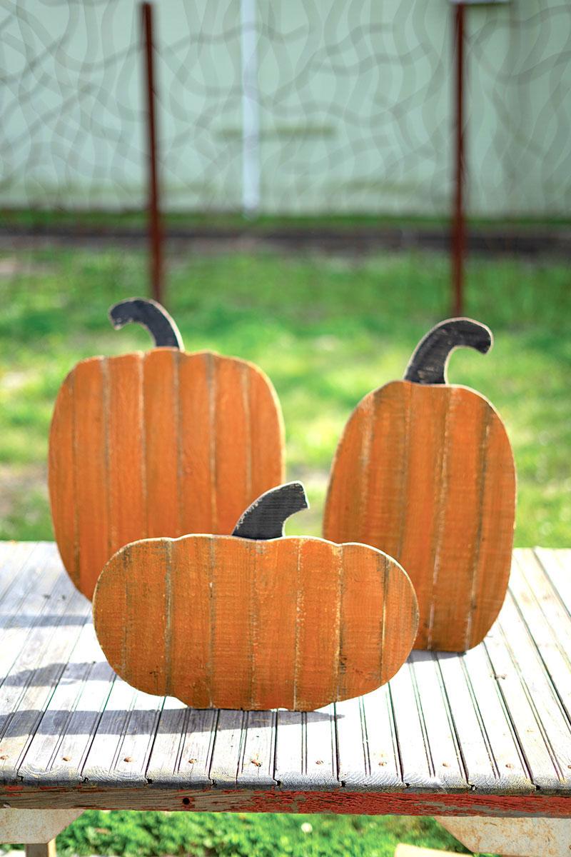 SET OF THREE WOOD PUMPKINS WITH STANDS