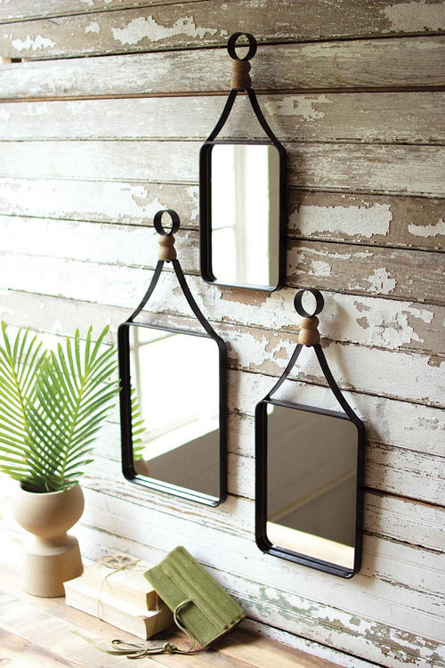 SET OF THREE METAL FRAMED MIRRORS WITH WOOD BALL DETAIL