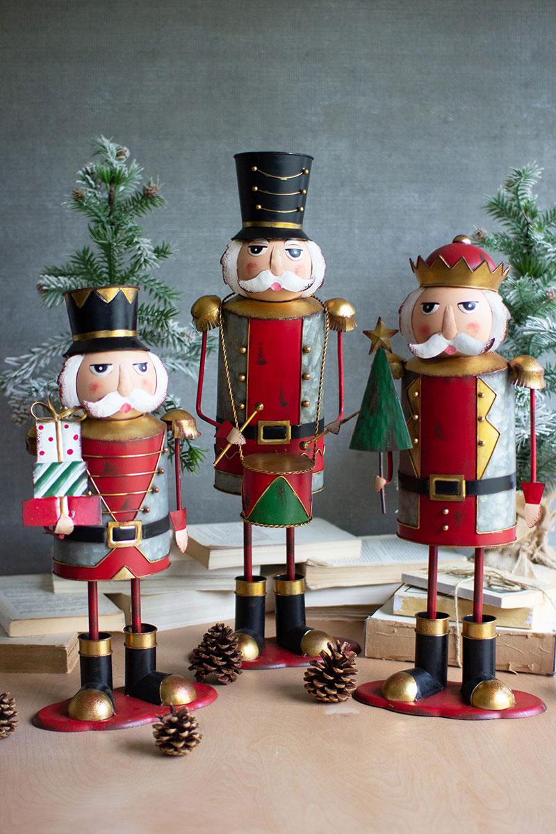 SET OF THREE PAINTED METAL NUTCRACKERS - ONE EACH DESIGN