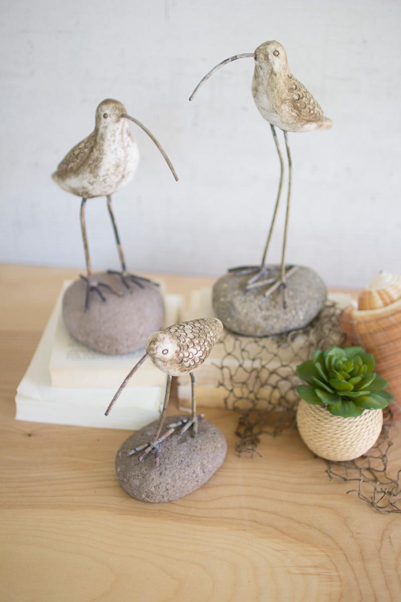 SET OF THREE PAINTED CLAY SHORE BIRDS ON ROCK BASES