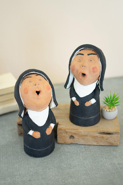 SET OF TWO SINGING CLAY NUNS