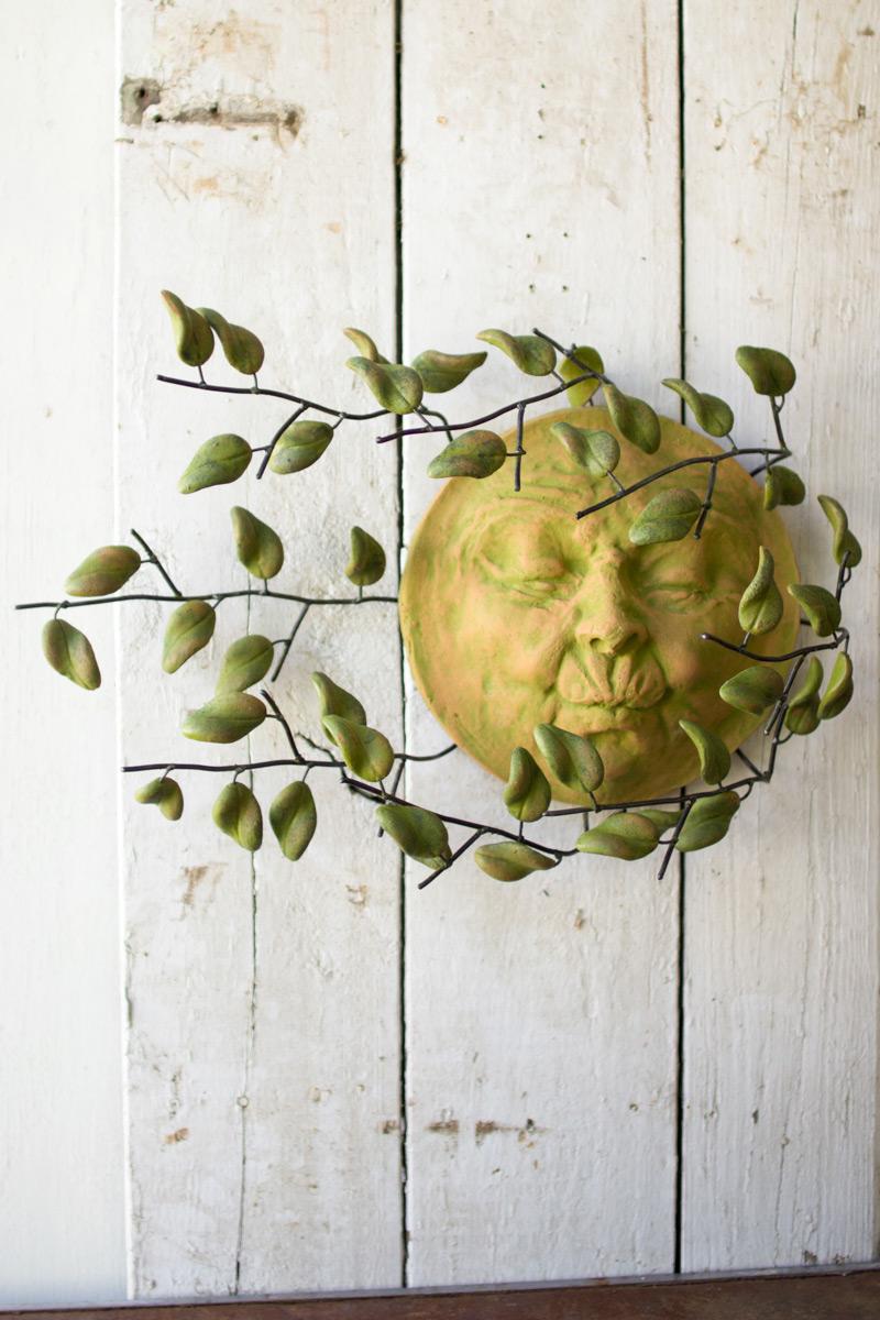 WALL HANGING WIND BLOWN SUN FACE WITH CLAY LEAVES