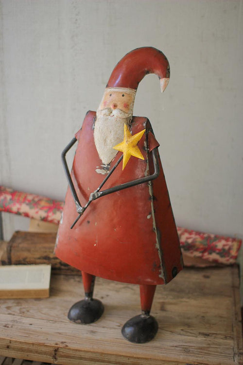 RECYCLED IRON SANTA HOLDING A STAR