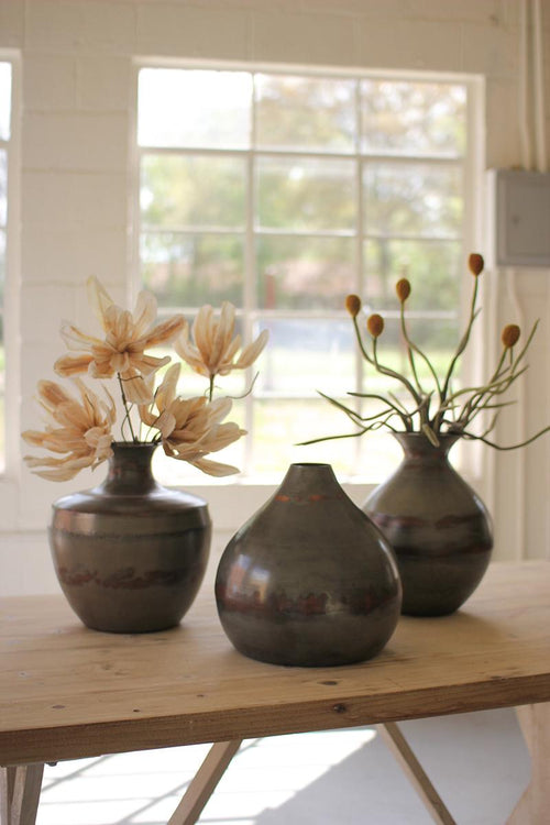 SET OF THREE VASES WITH RAW METAL AND COPPER DETAIL