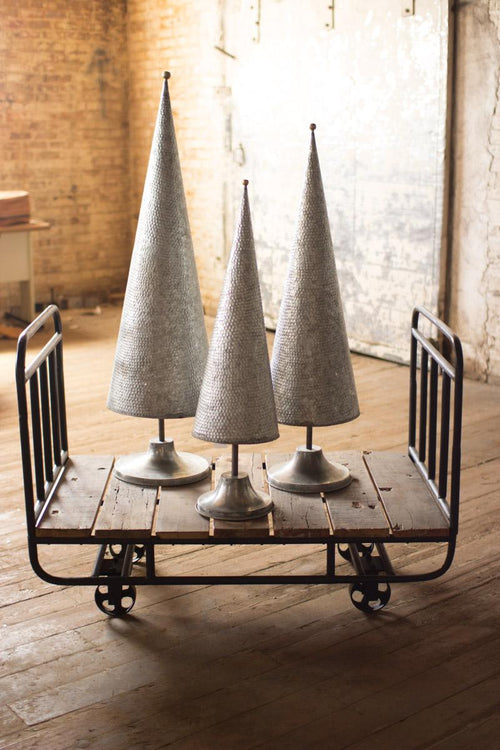 SET OF THREE GALVANIZED TOPIARIES WITH BRASS DETAIL